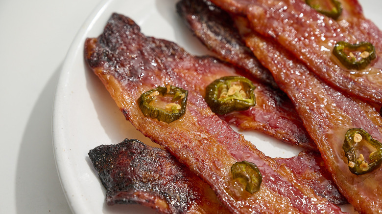 close up of jalapeno on bacon