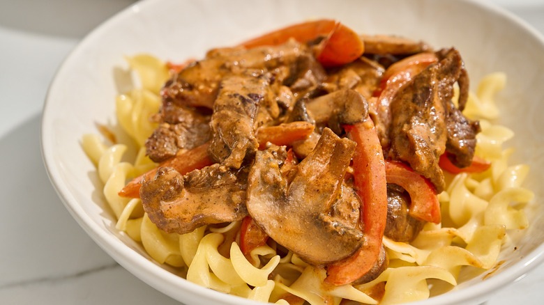 close up of beef stroganoff in a bowl