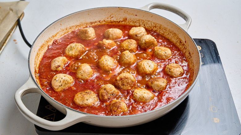 cooking meatballs in tomato sauce
