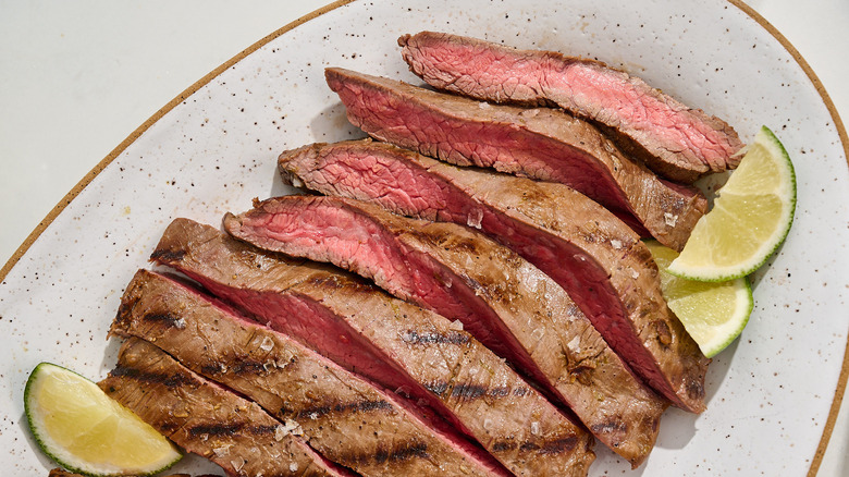slices of steak up close on a platter