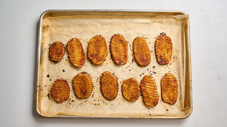 crispy browned potatoes on a sheet tray