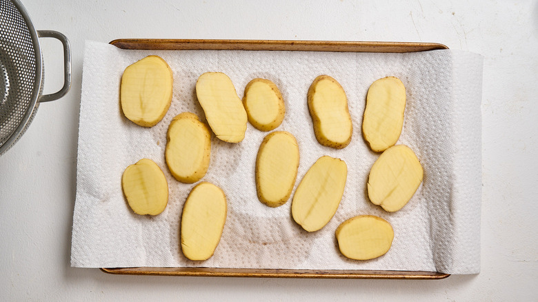 draining potatoes with paper towels