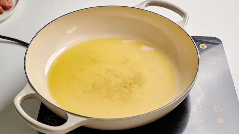 heating oil in a skillet