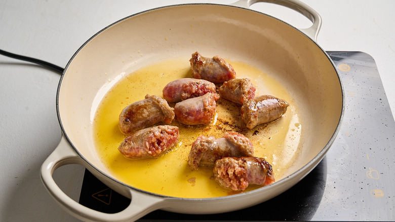 browning sausage in a skillet