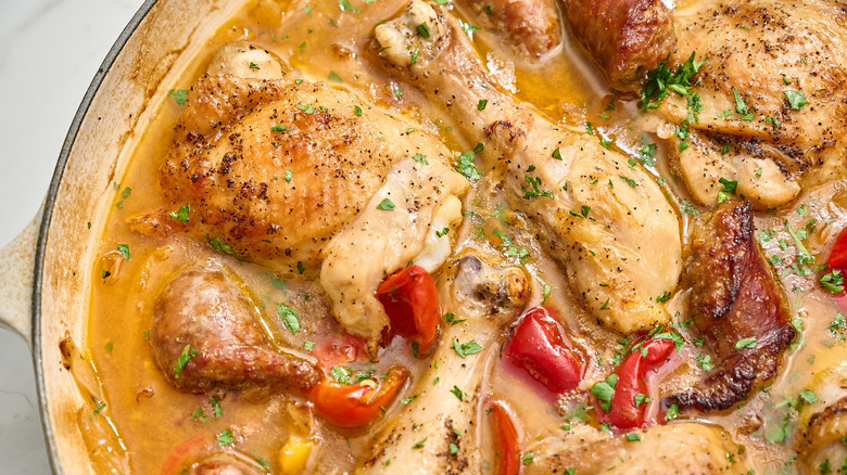 chicken scarpariello in a braising pan