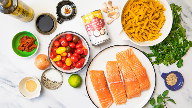 Ingredients for Thai curry pasta with blistered tomatoes and salmon.