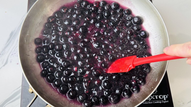 Blueberry topping cooking in saucepan