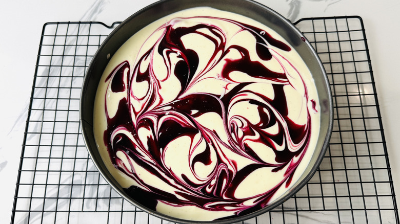 Cheesecake swirled with blueberry topping