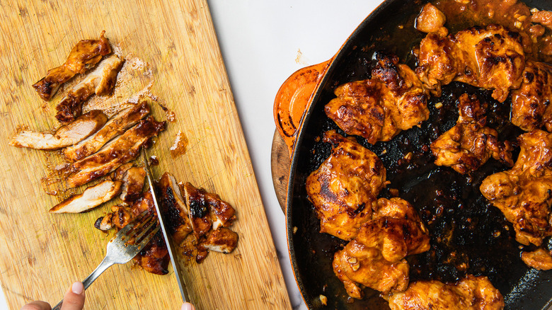 Slicing the chicken into 1-inch slices.