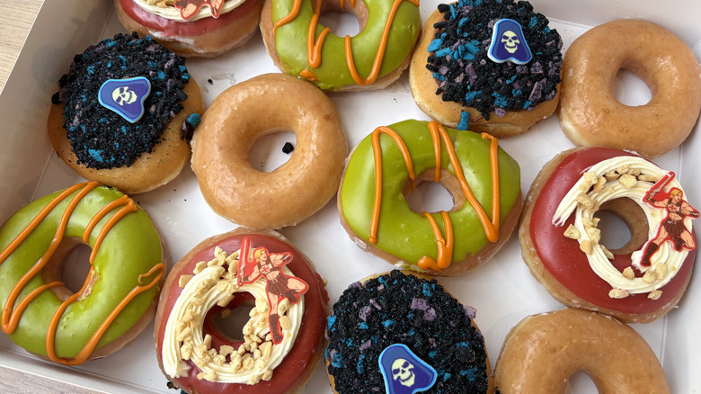 A box containing a dozen Krispy Kreme doughnuts from the limited-time Masters of the Universe Collection