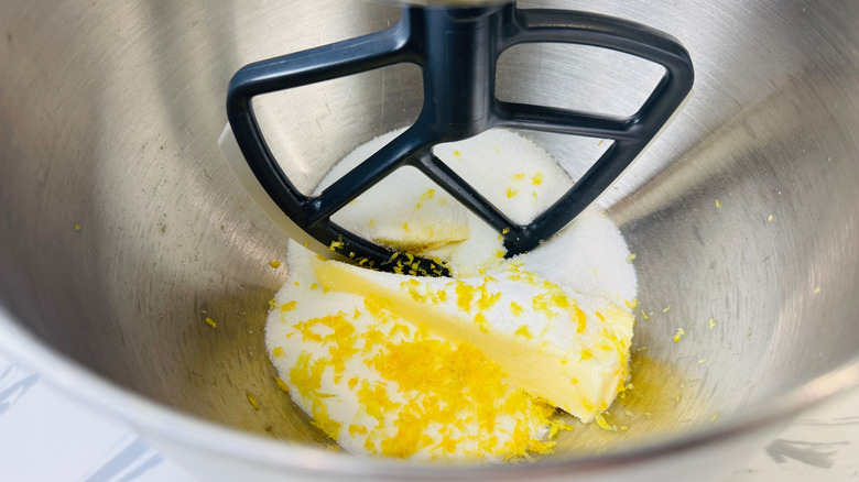 Butter, sugar, and lemon zest in stand mixer bowl