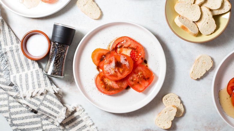 buttery tomatoes served on table