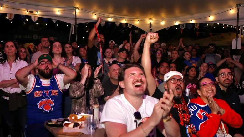 Fans watching a Knicks game at Bohemian Beer Garden