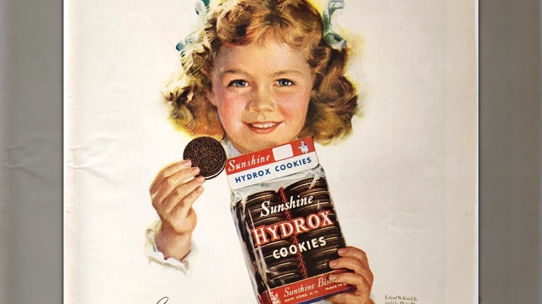 Mirrored image of a print ad for Hydrox cookies featuring a young girl holding a cookie