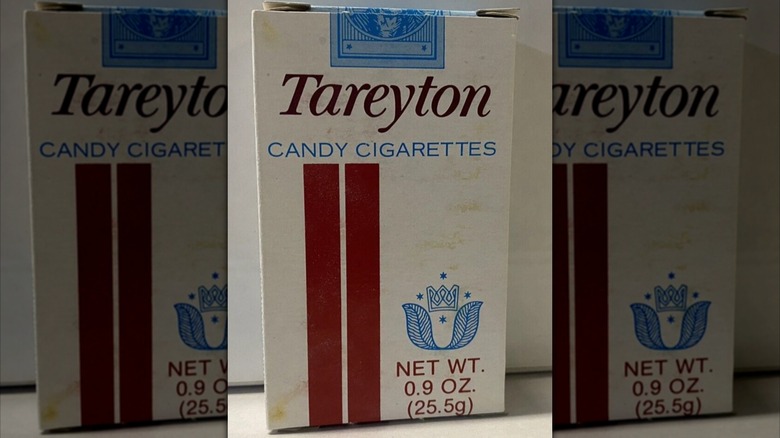 Mirrored image of vintage box of Tareyton candy cigarettes against white background