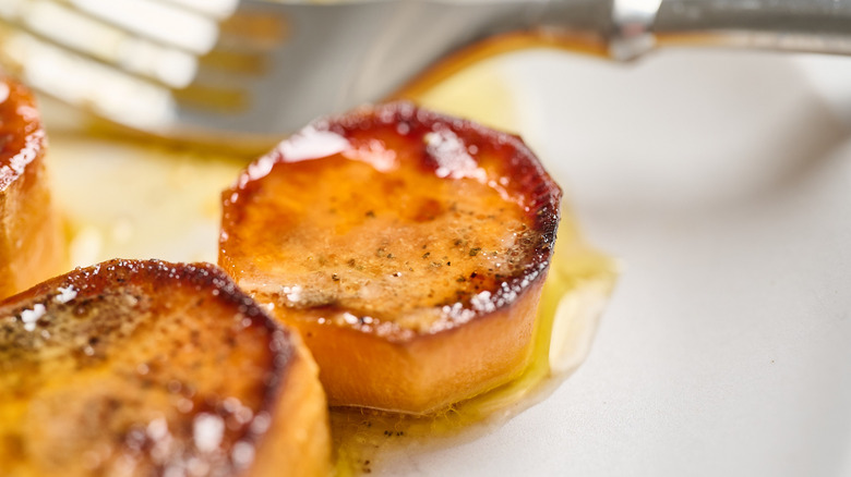 melting sweet potato on a plate with a fork