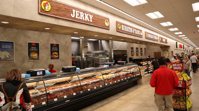 The interior of a Buc-ee's showing customers browsing the foods on offer