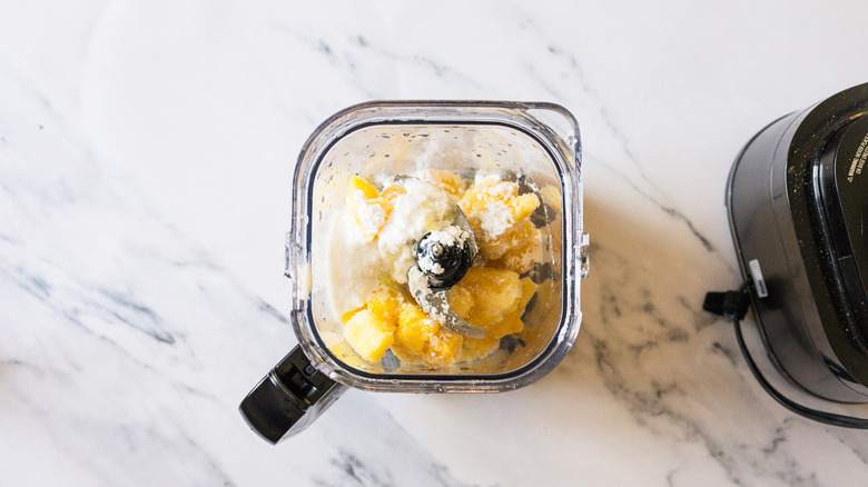 Ingredients for Dole Whip ice cream in blender.