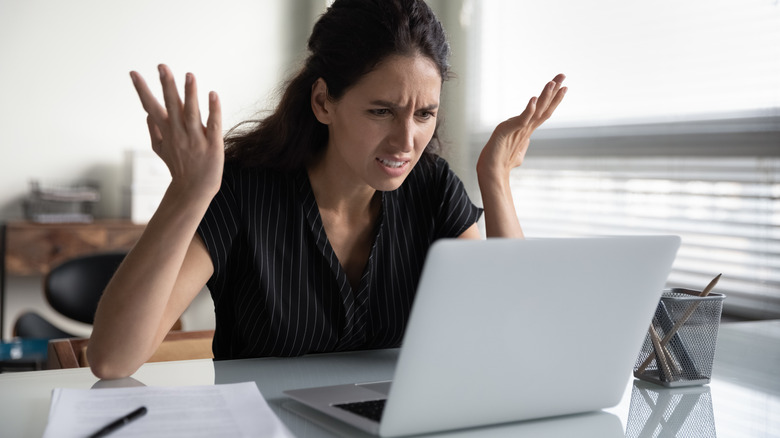 angry woman on laptop