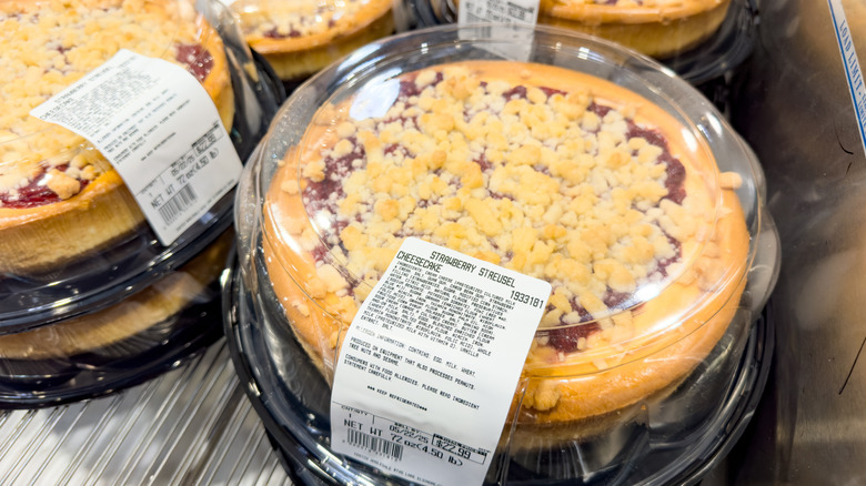 Costco Kirkland Signature Strawberry Streusel Cheesecakes on display in plastic packages