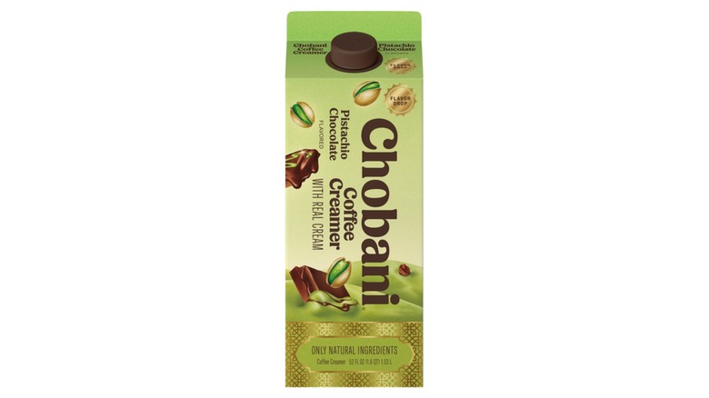 A carton of Chobani Pistachio Chocolate Coffee Creamer on white background