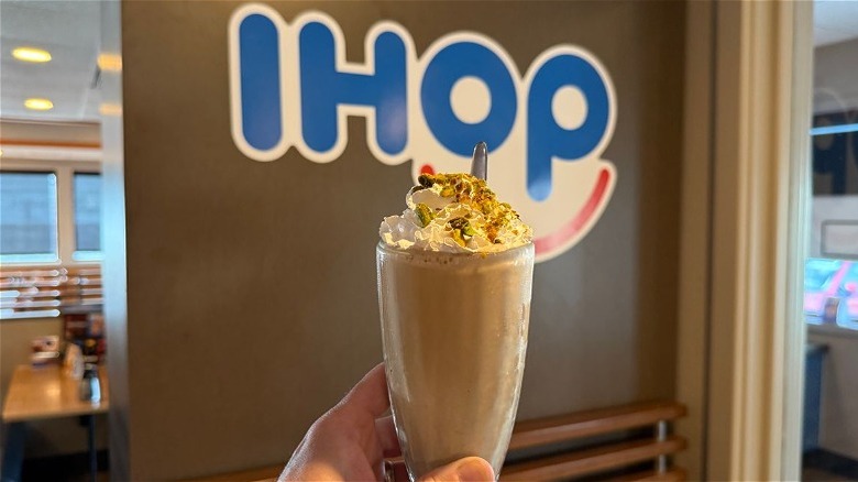 Dubai Chocolate Milkshake in front of an IHOP sign