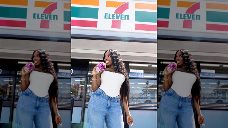 JaNa Craig drinking a Slurpee outside of a 7-Eleven store