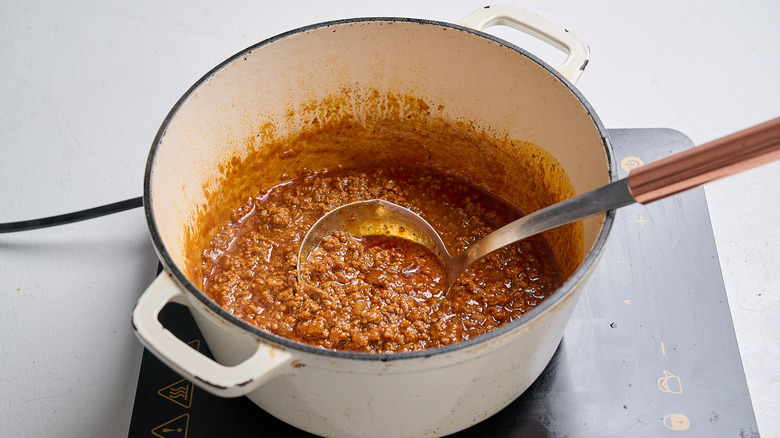 bison chili cooking on a stove