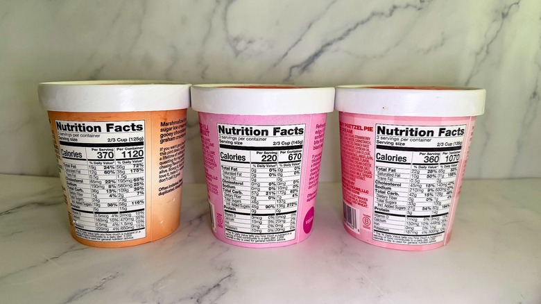 Three pints of Jeni's ice cream in line with nutrition info showing