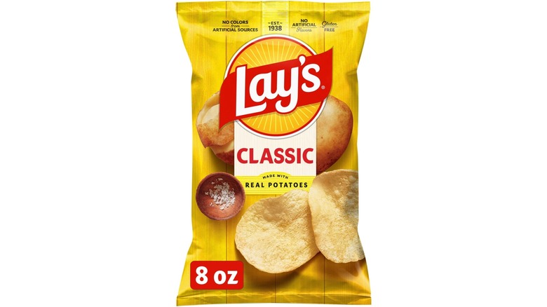 A bag of Lay's Classic potato chips on white background