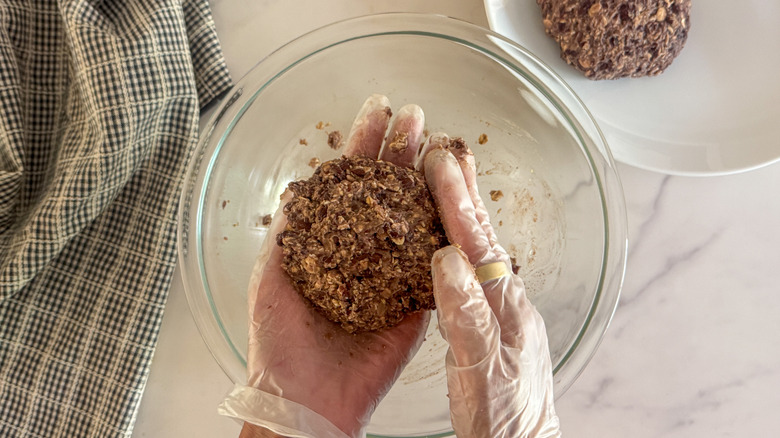 hands forming patties