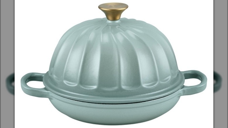 Crofton bread oven with a domed top and a golden top handle.