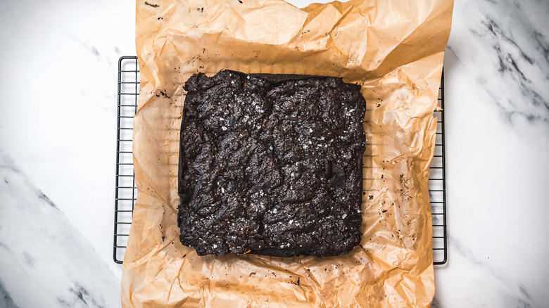 Brownies on parchment paper.