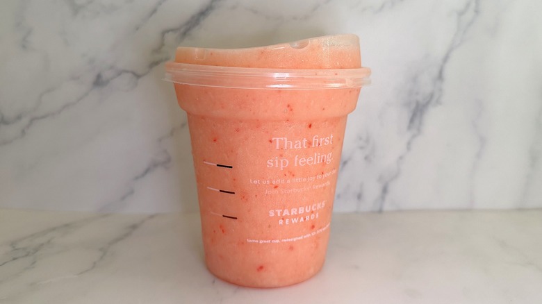 Starbucks Blended Mango Strawberry Energy Refresher on marble surface