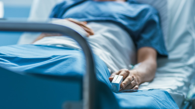 Patient lies sick in hosptial