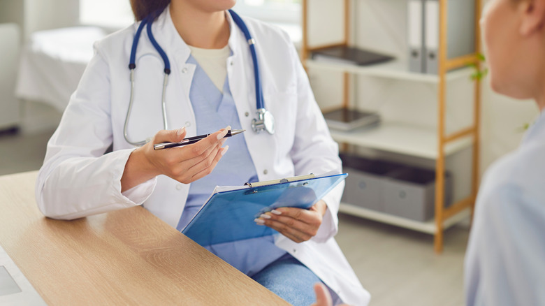 Doctor talking to patient