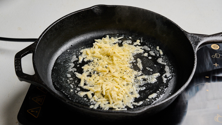 cheese melting in a skillet