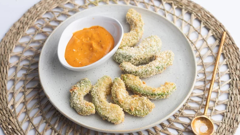 Air Fryer Avocado Fries on white plate with dipping sauce