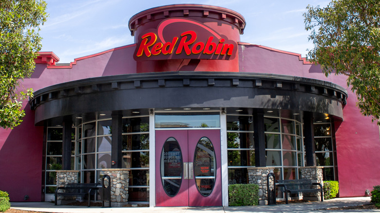 Red building with large sign spelling 