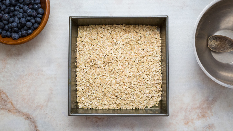 rolled oats in baking dish