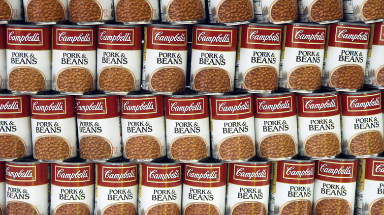 Stacks of Campbell's pork and beans cans displayed