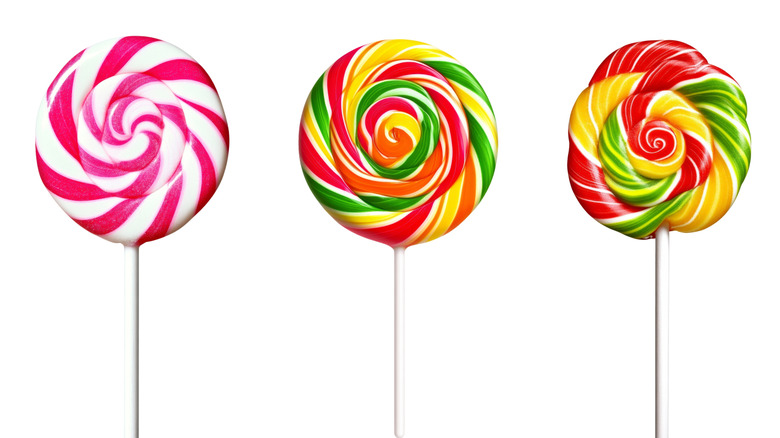 Trio of classic big lollipops on a white background