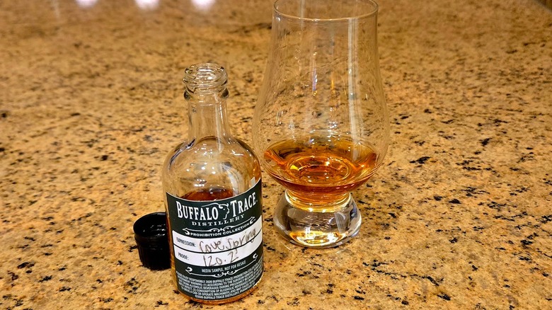Bottle of Cove Spring whiskey and glass