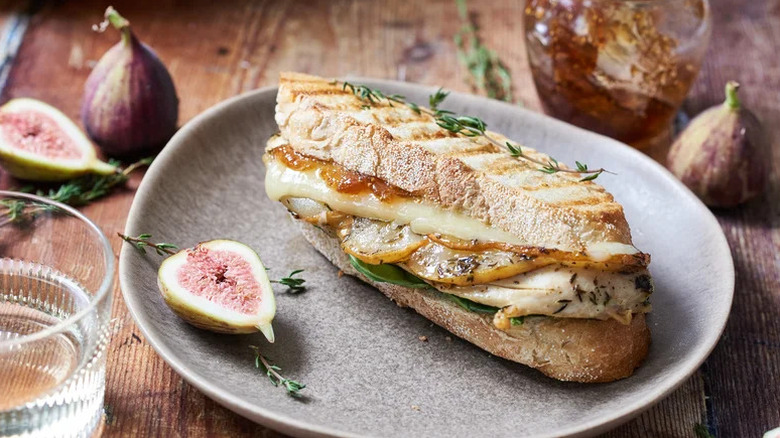 Chicken and Pear Panini with figs on grey plate