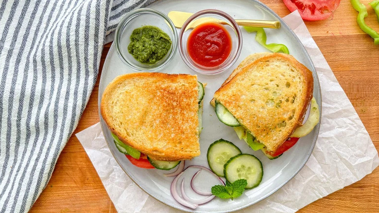 Golden Bombay Sandwich with Cilantro Mint Chutney on white plate