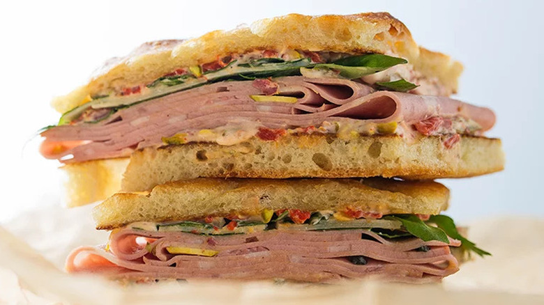 Turkey Panini with Chipotle Cranberry Spread on wooden board