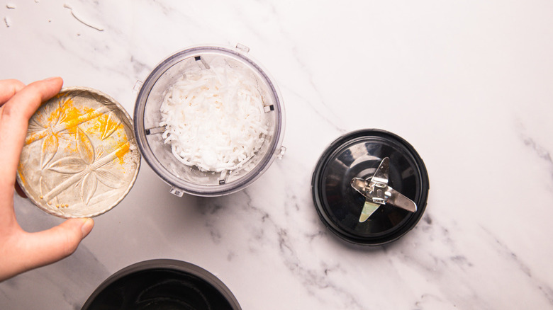 Adding ingredients to blender.