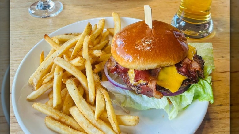 Applebee's cheeseburger with bacon and a side of French fries