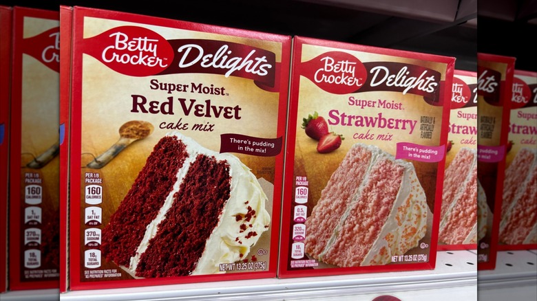 Betty Crocker cake mixes displayed on a store shelf.