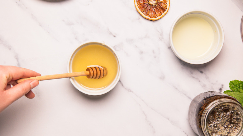 Stirring honey syrup